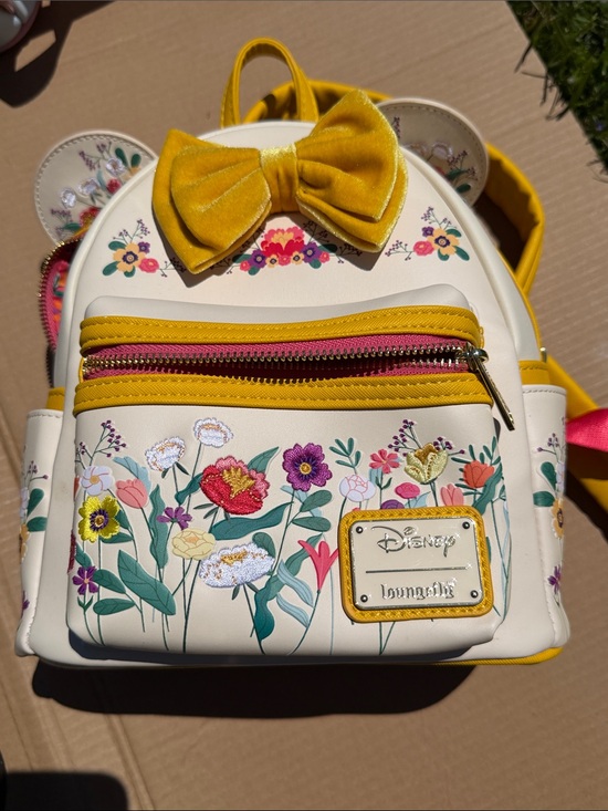 Disney Handbags - Disney Cream Floral Mini Backpack with Yellow Bow and Pink Zipper Accents